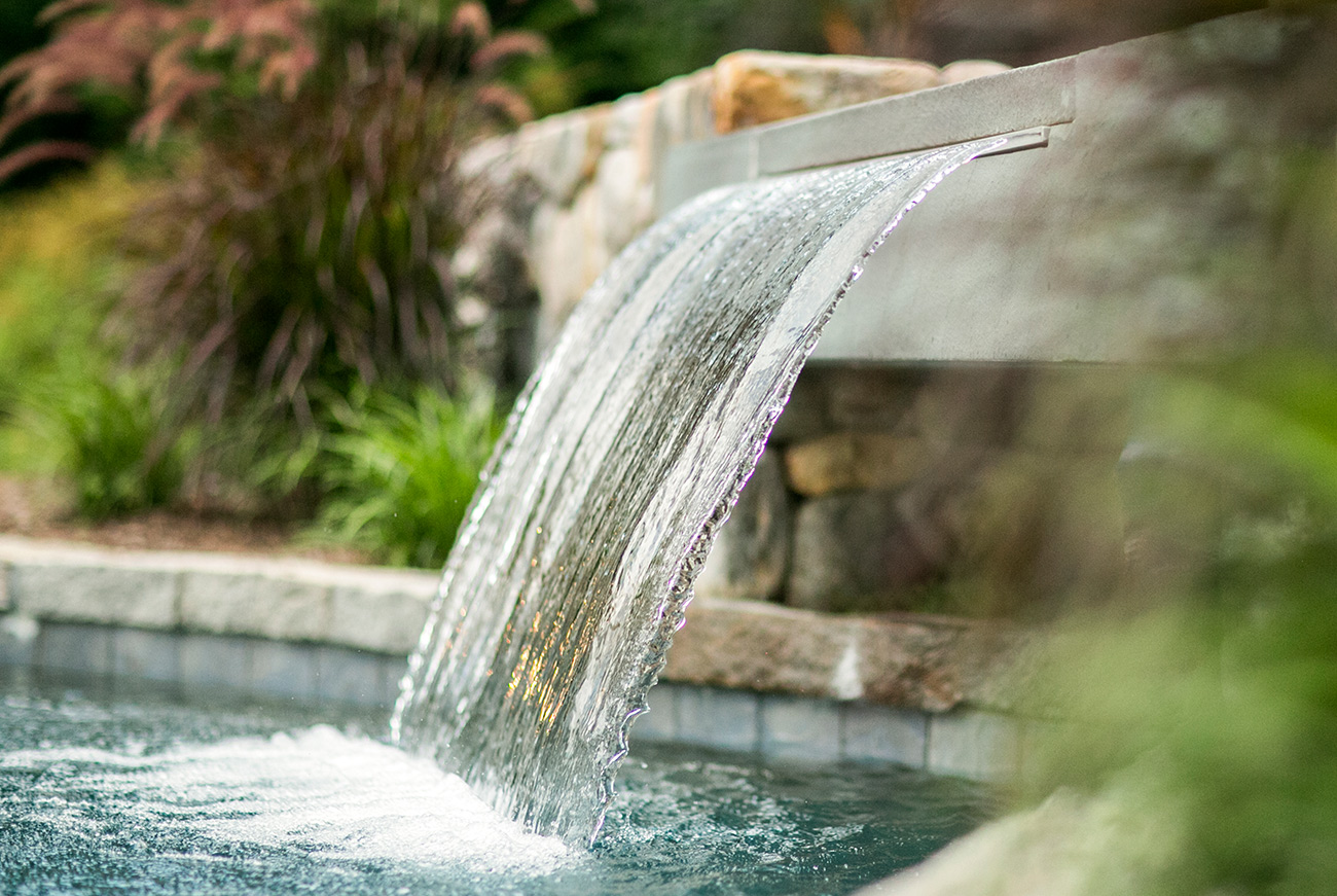 The LaurelRock Company - Residential Landscaping in CT - Hollow Tree Ridge - Water Feature in Pool